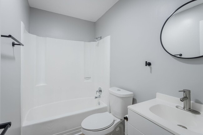 Building Photo - Discover Modern Living at Genesis Apartments