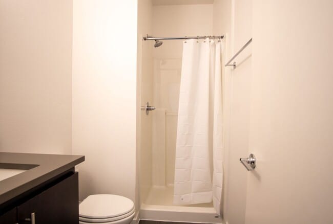 Building Photo - APPS ON US! Modern & Sleek One-Bedroom Tow...