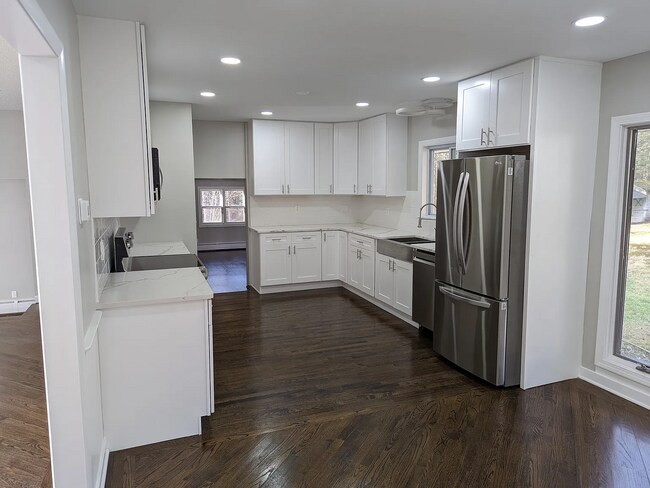 Building Photo - this contemporary & brightly remodeled 2,400 sqft home