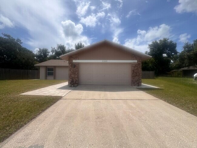 Building Photo - Fully Renovated Palm Harbor Home