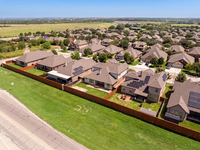 Building Photo - No Rear Neighbors, 3 Car Garage, a Chef's Kitchen, and Room for Everyone