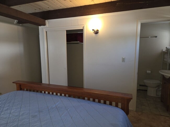 Building Photo - Unique open design,wood beams in all rooms-Very cheery and cozy. Newly remodeled, and newly furni...