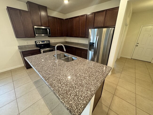 Building Photo - 12093 Stone Bark Trail