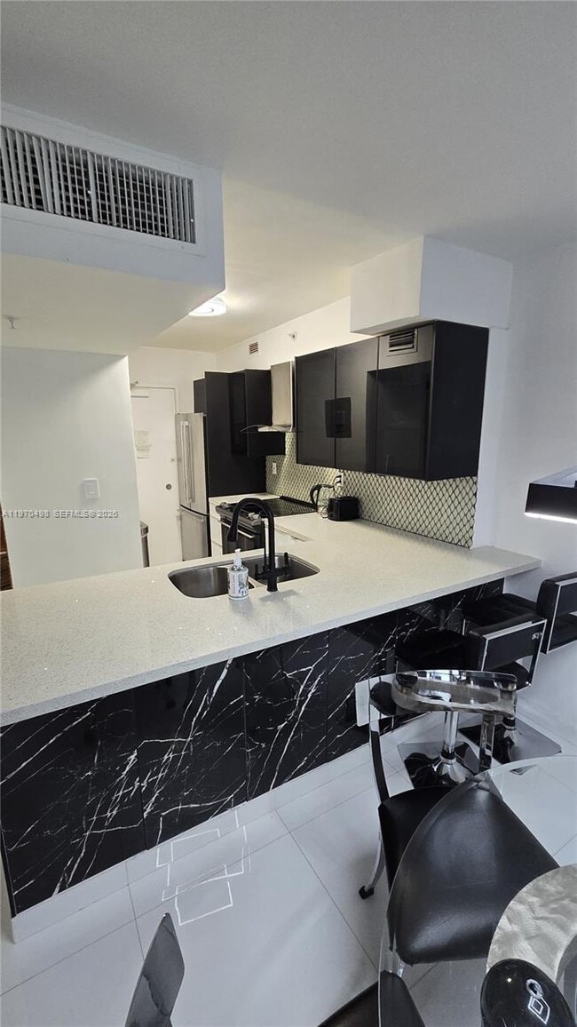 Building Photo - 9195 Collins Ave