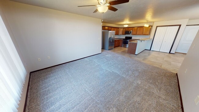 Building Photo - LOWER LEVEL 3 BEDROOM, 2 BATH TOWN HOME, INDIVIDUAL ENTRANCE, DOUBLE ATTACHED GARAGE, PET FRIENDLY