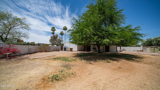 Building Photo - 648 E Tam O Shanter Dr