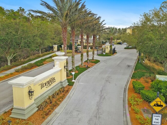 Building Photo - Introducing a captivating 3-story townhome...