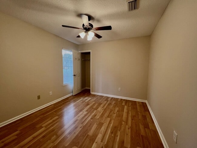 Building Photo - Behind the Gates: A Corner-Lot 4 bedroom, 2 bath Retreat in Coveted Pace Island!!