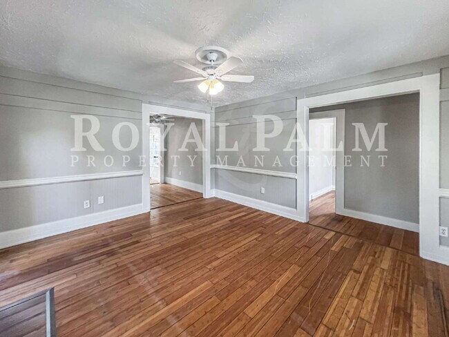 Building Photo - Deck the halls or the French doors, because this charming century-old single family home is avail...