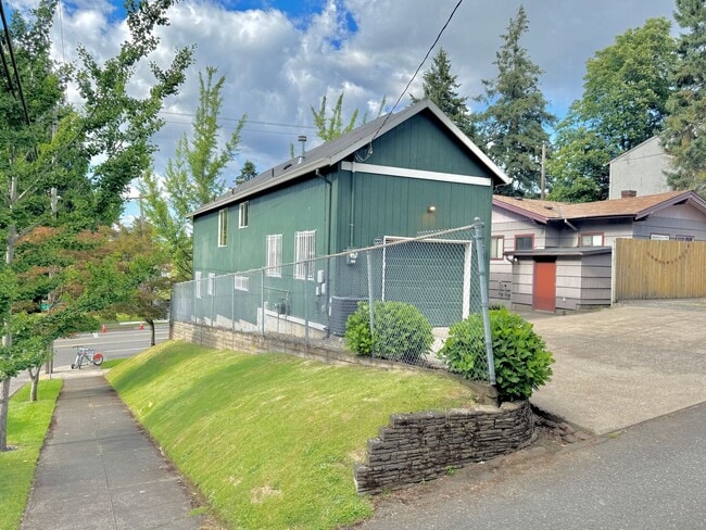 Building Photo - Montavilla Polished 2-Story with Hardwoods, Whole House A/C, Attached Garage, Off-street Parking