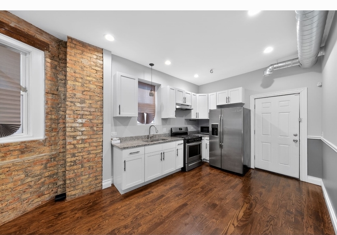 Building Photo - 7038 S Eberhart Ave