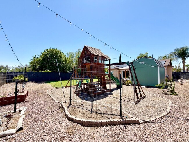 Building Photo - Beautifully Renovated 4 Bedroom Home with INCLUDED Solar, Large Backyard & Gazebo