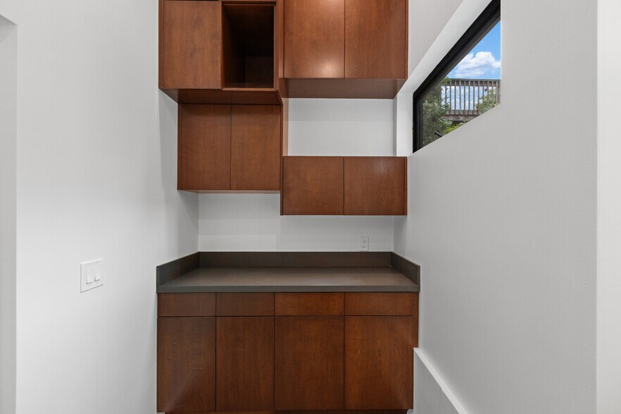 Utility space right off of garage for convenient storage. - 4640 Del Monte Ave
