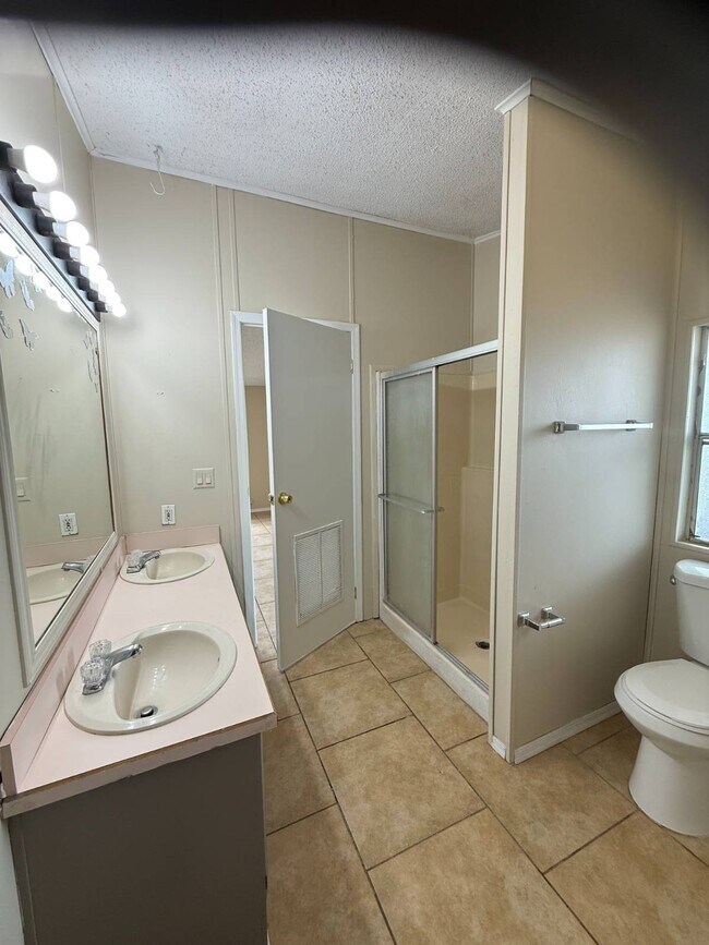 Building Photo - 6575 N Pelto Path