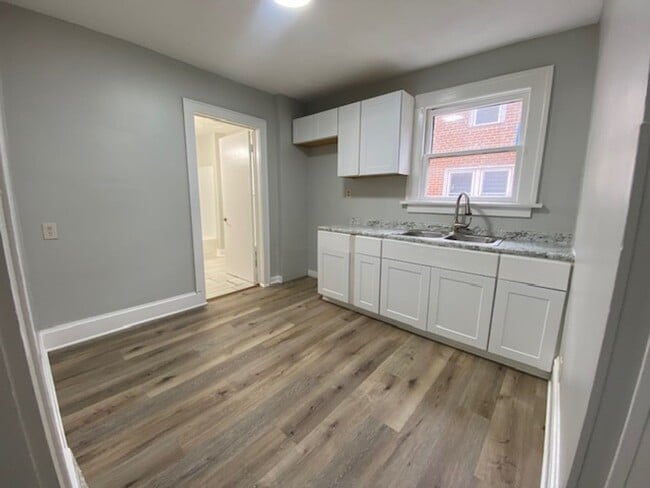 Building Photo - Updated 5-Bed, 2-Bath with Attic Suite & C...