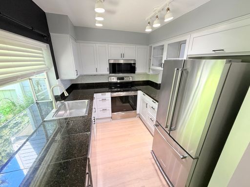 Building Photo - Spacious Magnolia Townhome with a View for $4495 - Available for Move in!