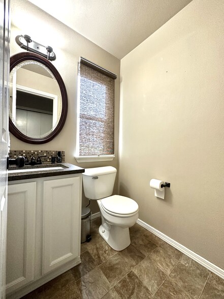 Half bath - downstairs - 13636 Duane St