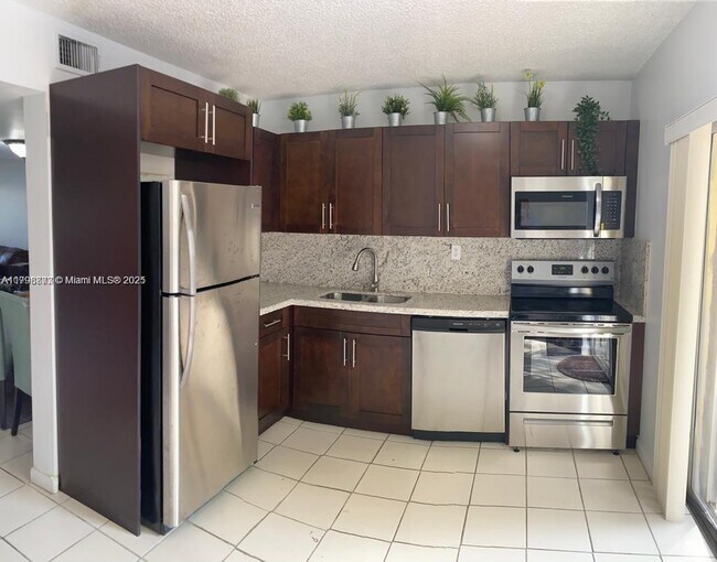 Building Photo - 560 NW 82nd Pl