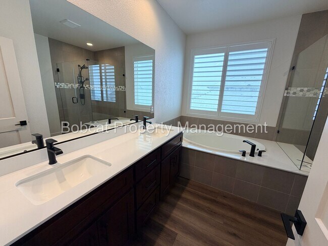 Building Photo - Modern Lock-and-Leave Living in the Heart of Carson City