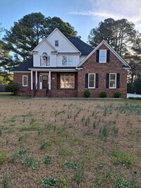 Building Photo - 4 Bedrooms 3 bath