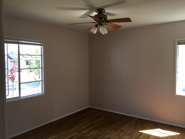 Master Bedroom with Hardwood Floor - 7823 Midfield Ave