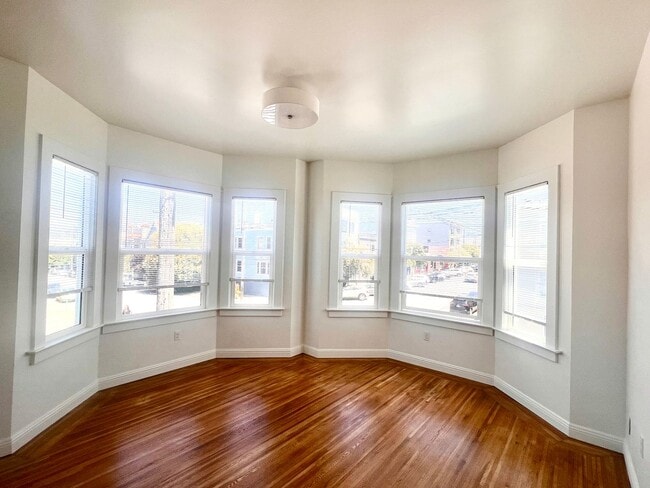 Building Photo - Fully Renovated Bright Corner Apartment wi...