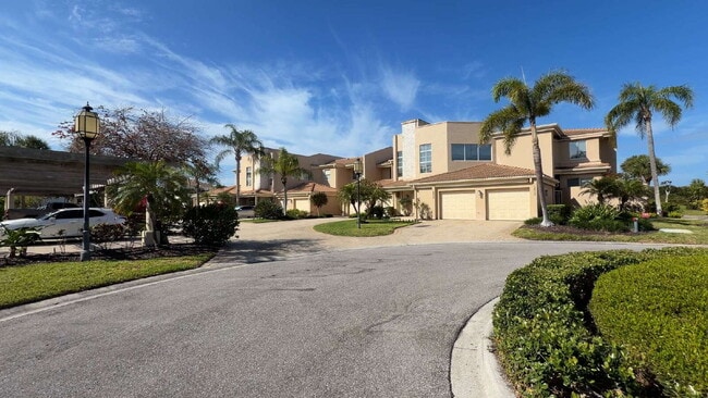 Building Photo - Luxury Furnished Longboat Key Retreat with Private Beach Club Access & Golf Course Views Remodele...