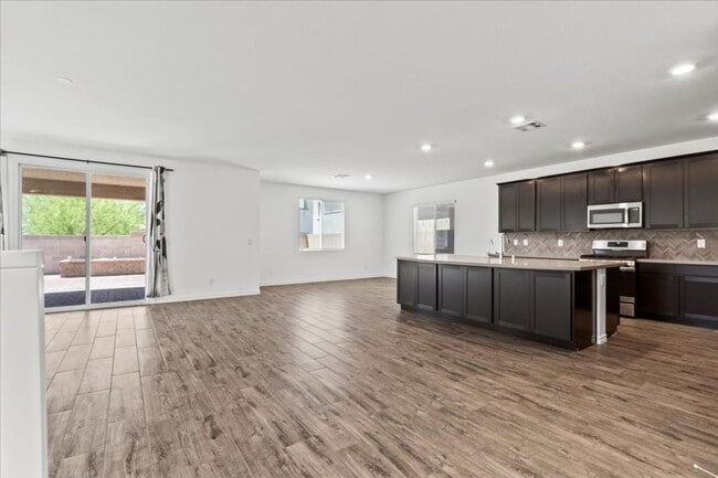 Building Photo - Spacious 5-bedroom home in gated community