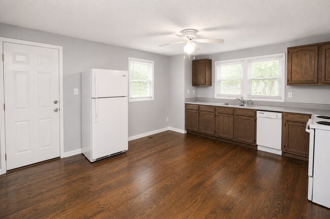 Building Photo - Updated Multi-Bedroom Home | Brand-New Deck | Circular Drive | Triad Premier Realty