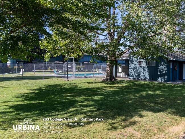 Building Photo - Two Bedroom Townhouse with Private Patio and Community Pool