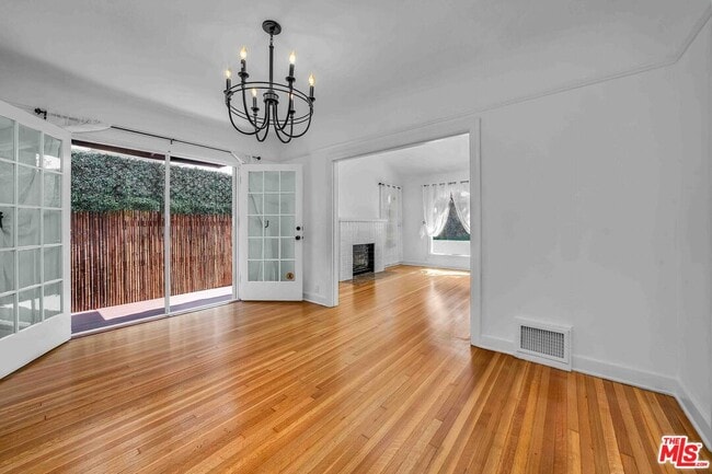 Building Photo - 223 N Almont Dr