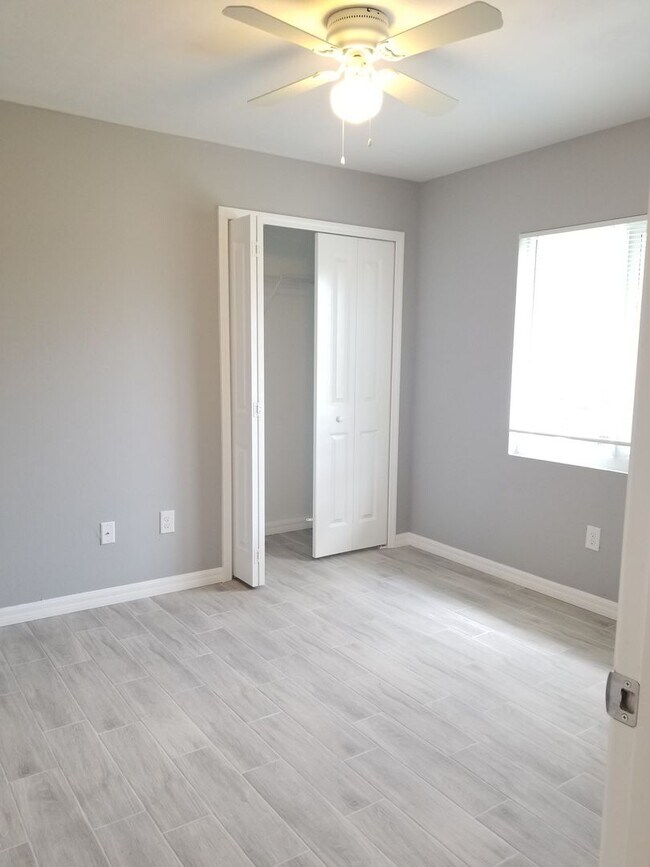 Building Photo - Spacious 3-Bedroom Home with Private Lanai & Prime Location!