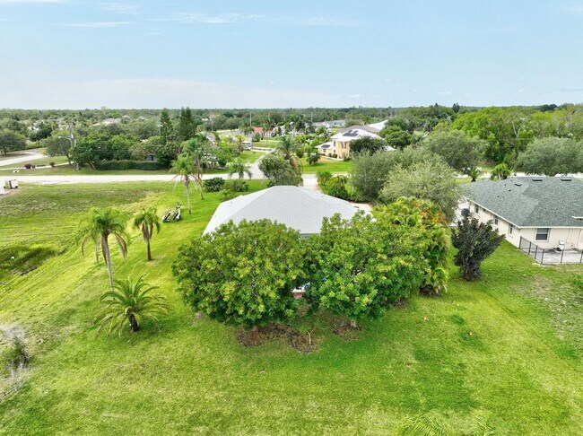 Building Photo - A BOATER'S PARADISE WITH THIS STUNNING 3 BEDROOM, 2 BATH WATERFRONT POOL HOME W/DOCK & BOAT LIFT ...