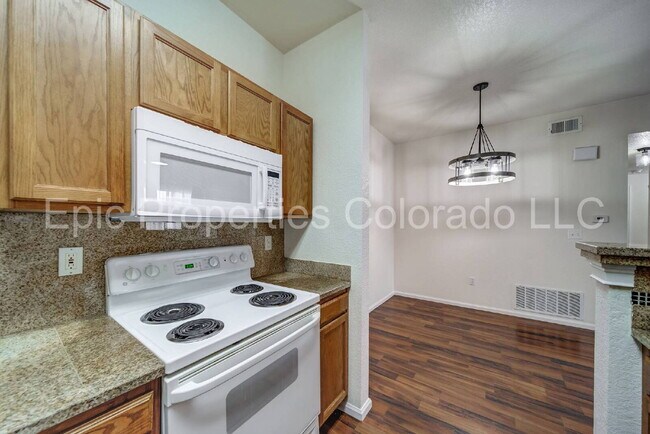 Building Photo - First Floor Corner 2 bed/2bath unit by Buckley SFB! Deeded Parking Right in Front!
