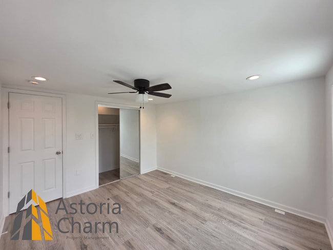 Building Photo - 3 Bedroom End Unit with Finished Basement and Fenced Yard on E 28th Street