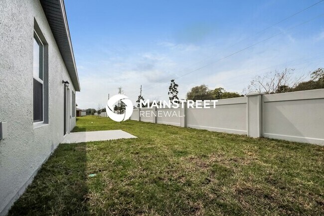 Building Photo - 4 Bedroom Pet-Friendly Home in Haines City, FL with Main Street Renewal