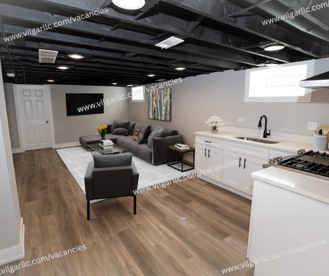 Building Photo - SPECIAL OPPORTUNITY – LARGE 6 BEDROOM RELATED-LIVING HOME