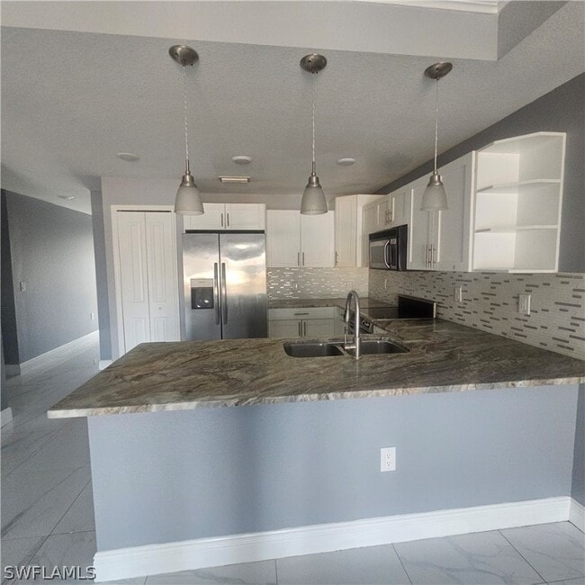 Building Photo - 131 Gilbert Ave S