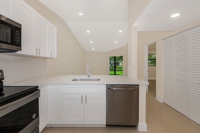Building Photo - Fully Renovated Corner 1/1 “Villa” with Ba...