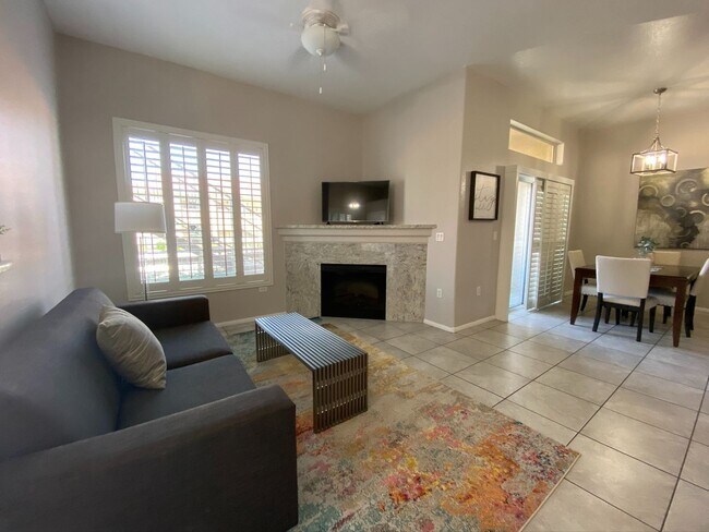 Building Photo - BEAUTIFUL CONDO IN A GATED COMMUNITY FEATURING PLANTATION SHUTTERS, TILE FLOORING AND NEW PAINT T...