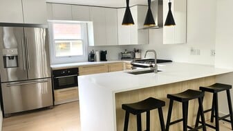 remodeled kitchen, featuring a gas range, convection microwave, and dishwasher - 411 10th Ave