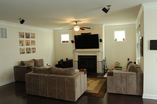 Large living room with 5.1 surround sound hookups available. - 681 Fielding Run Dr