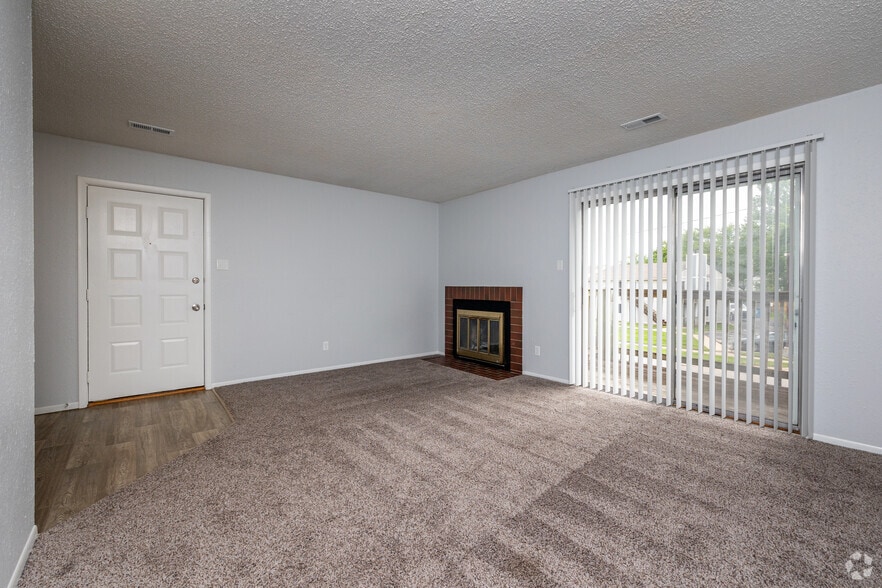 1BR, 1BA - 730 SF - Living Room - Whitehall Apartments