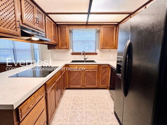 Building Photo - Spacious 4 Bed, 2 Bath Home with Fenced Yard and Two-Car Garage | Pet friendly | Available Now!