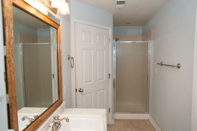 Building Photo - Updated and Bright 2B/2B with Attached Garage Now Available!