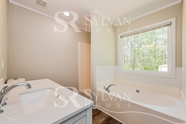 Building Photo - The living is easy in this 3 bedroom, 2 ba...