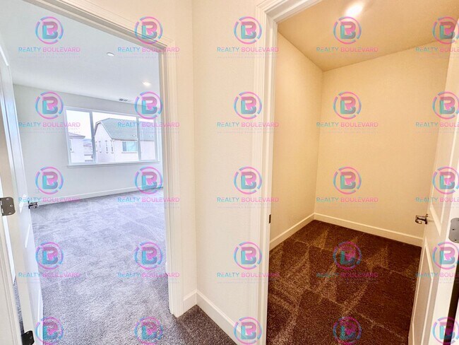 Building Photo - Modern Elegance: Stunning  New 4-Bedroom Home with Chef’s Kitchen & Dual Living Spaces