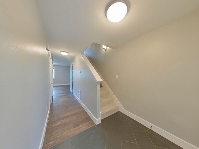 Building Photo - Stunning 3-bedroom, 2.5-bathroom condo with attached 2 stall garage!