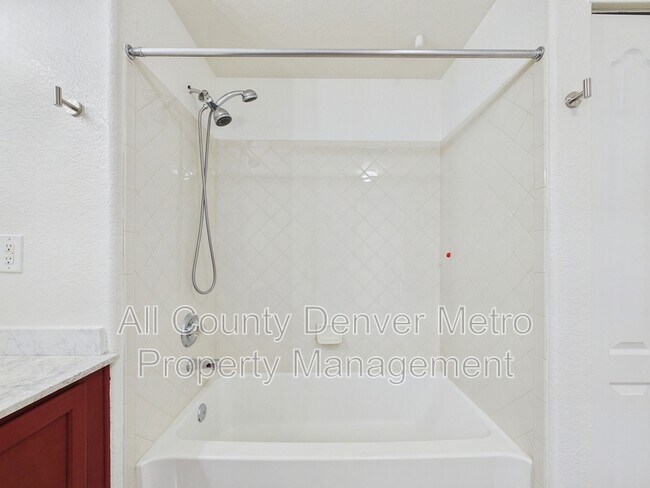 Building Photo - 10239 W 55th Dr