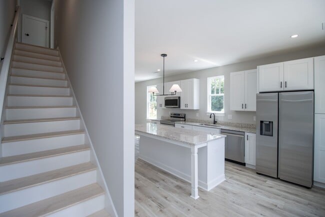 Building Photo - Pick Your Neighbors! Brand-New 3 Bed, 3 Ba...